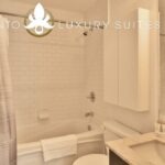Shower and Bath view of bathroom in a luxury furnished apartment in Toronto